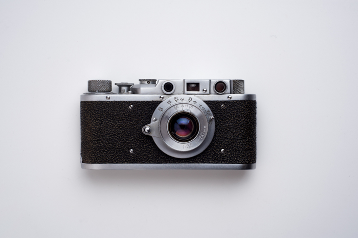 An old film camera on white background - understanding the viewfinder in photography