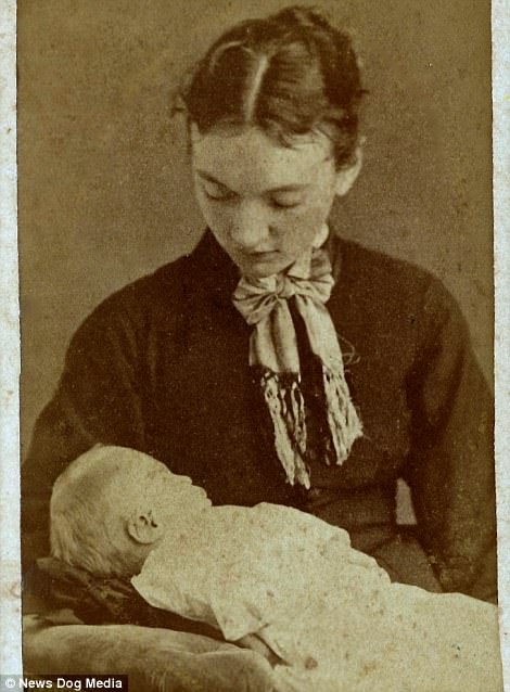 A Carte de Visite postmortem image of a baby from New York, USA, circa 1875