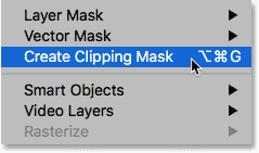 Selecting the Create Clipping Mask command from the Layer menu in Photoshop