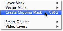 Selecting the Create Clipping Mask command from the Layer menu in Photoshop. 